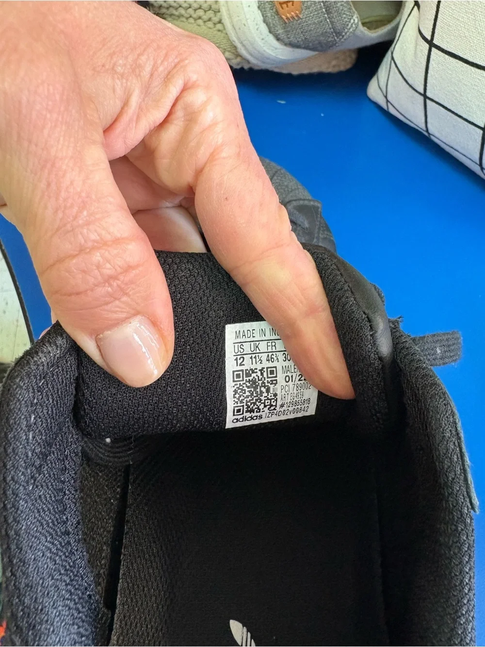 adidas Men’s Black & White Superstar Sneakers with Gold Logo
